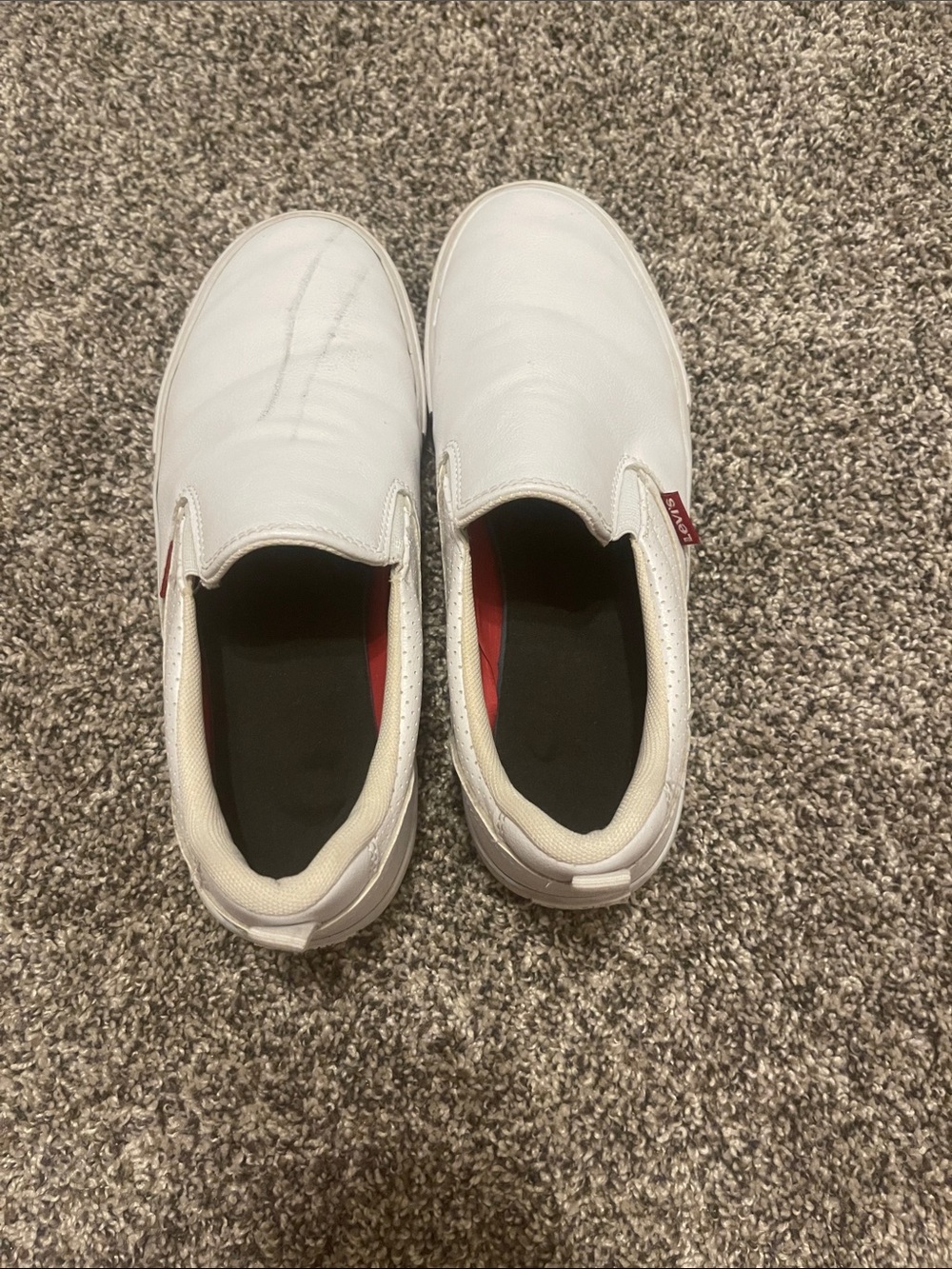 Levi's White Slip-On Sneakers with Red Logo Tabs